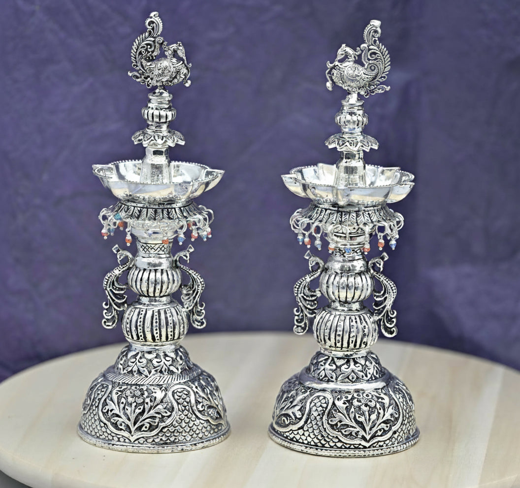 German Silver Peacock Diya Pair – Antique Finish Pooja Lamps for Temple & Auspicious Gifting