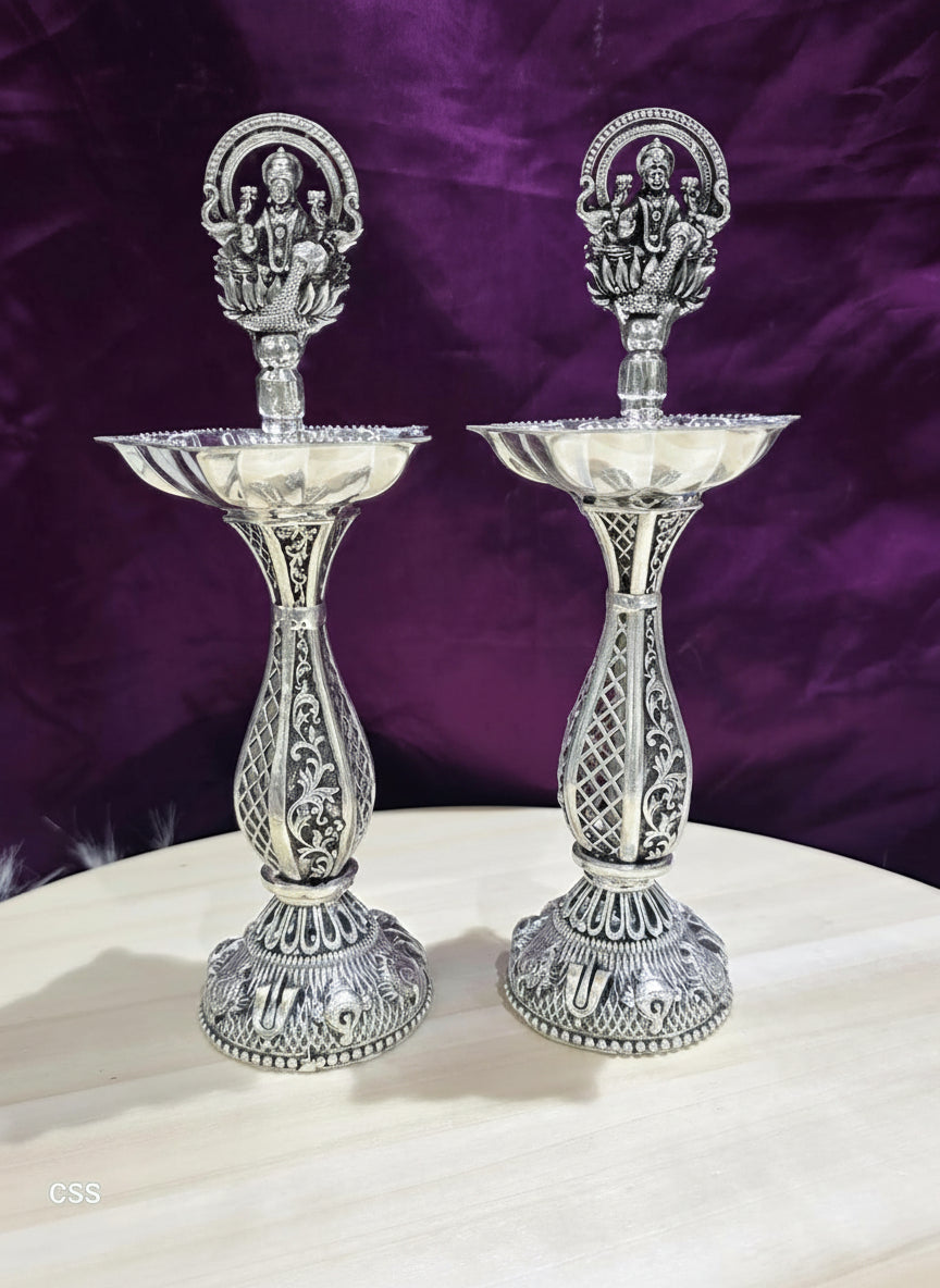 German Silver lakshmi Diya Pair – Antique Finish Pooja Lamps for Temple & Auspicious Gifting, 9"