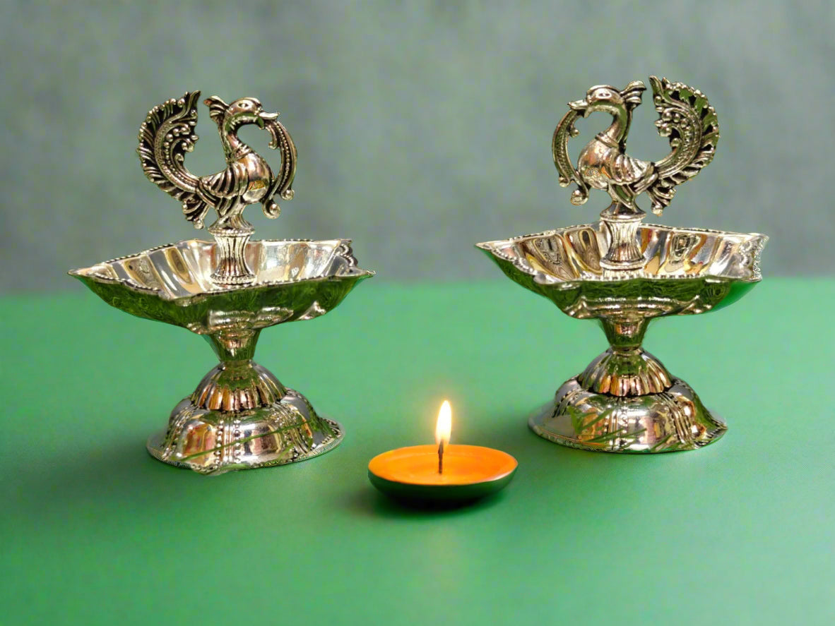 silver plated peacock diya set for housewarming/ diwali