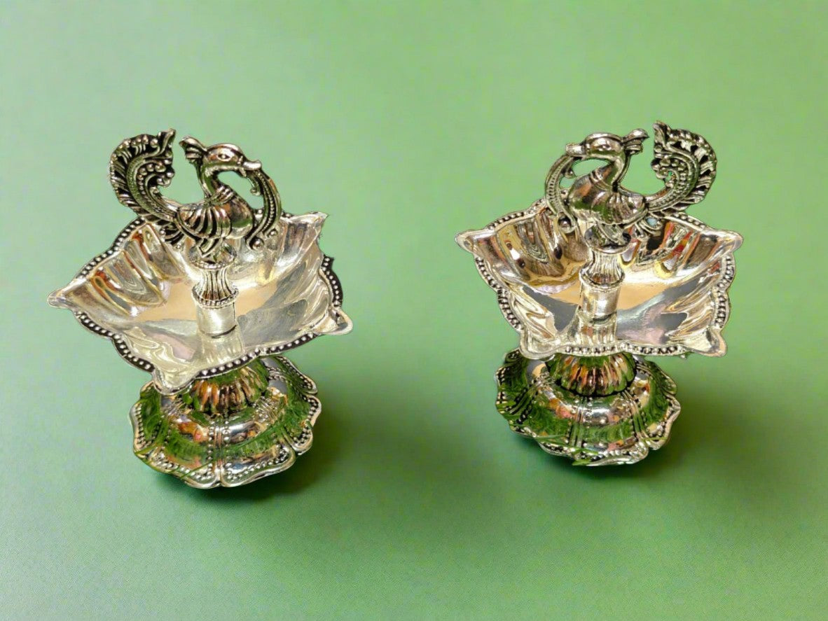 silver plated peacock diya set for housewarming/ diwali