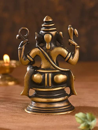 a Beautiful Brass Ganesh with Four Hands Statue/Home décor/showpiece diety for Temple