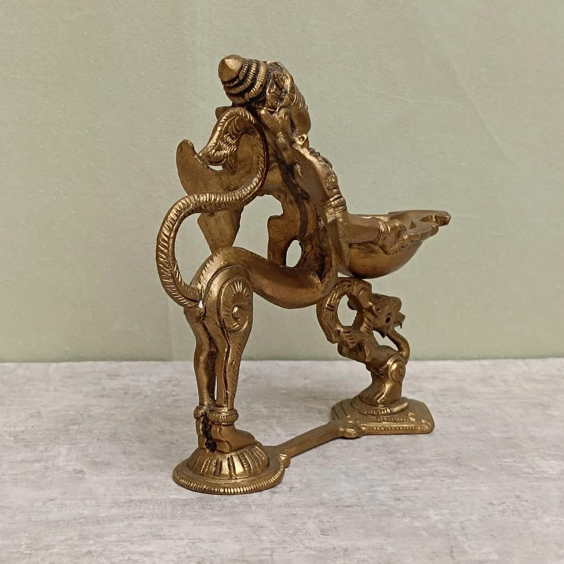 a beautiful Brass Garuda Aarti Diya Home décor/showpiece (L- 6in, W- 2.5in, H- 5in)