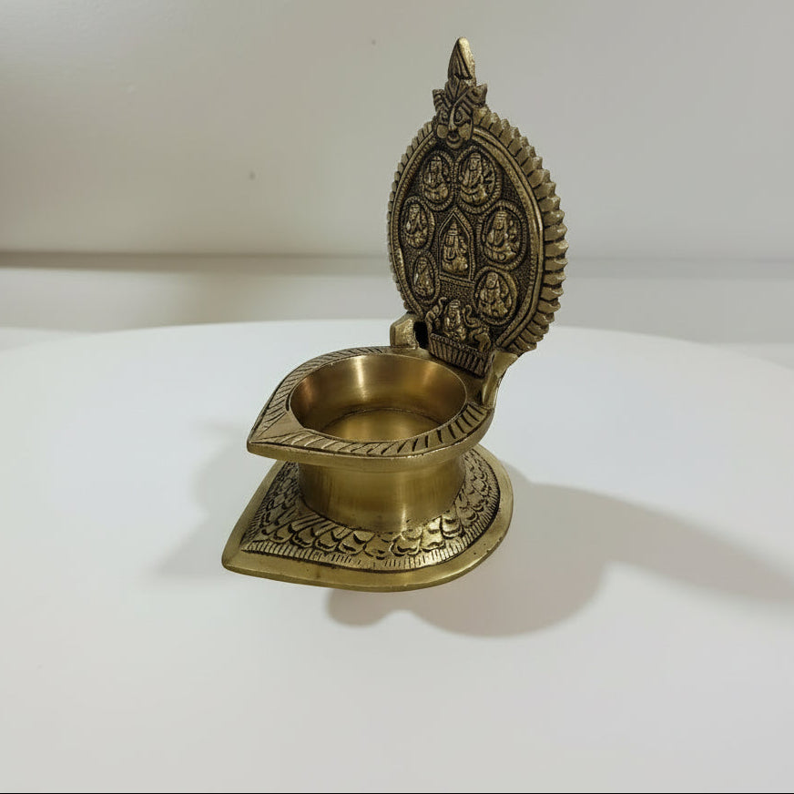 Brass Ashtalakshmi Diya  Handcrafted Pooja Lamp  Goddess Lakshmi’s Eight Forms for Prosperity & Blessings