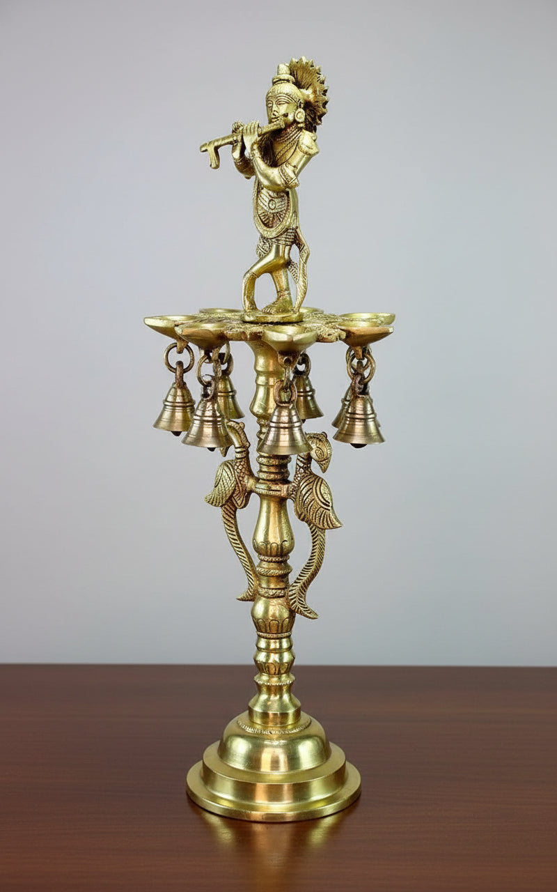 Brass Krishna Playing Flute Standing Diya Set  7 Diyas & 7 Bells  Handcrafted Temple & Home Décor