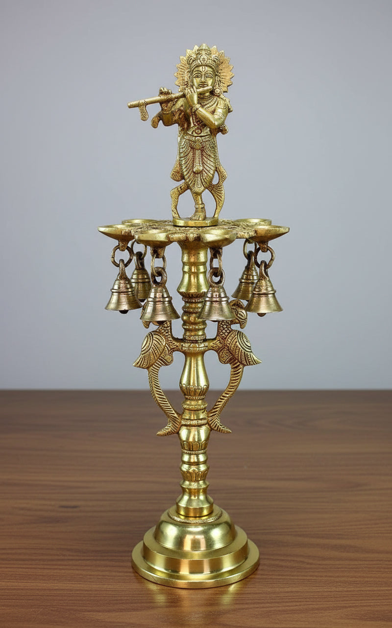 Brass Krishna Playing Flute Standing Diya Set  7 Diyas & 7 Bells  Handcrafted Temple & Home Décor