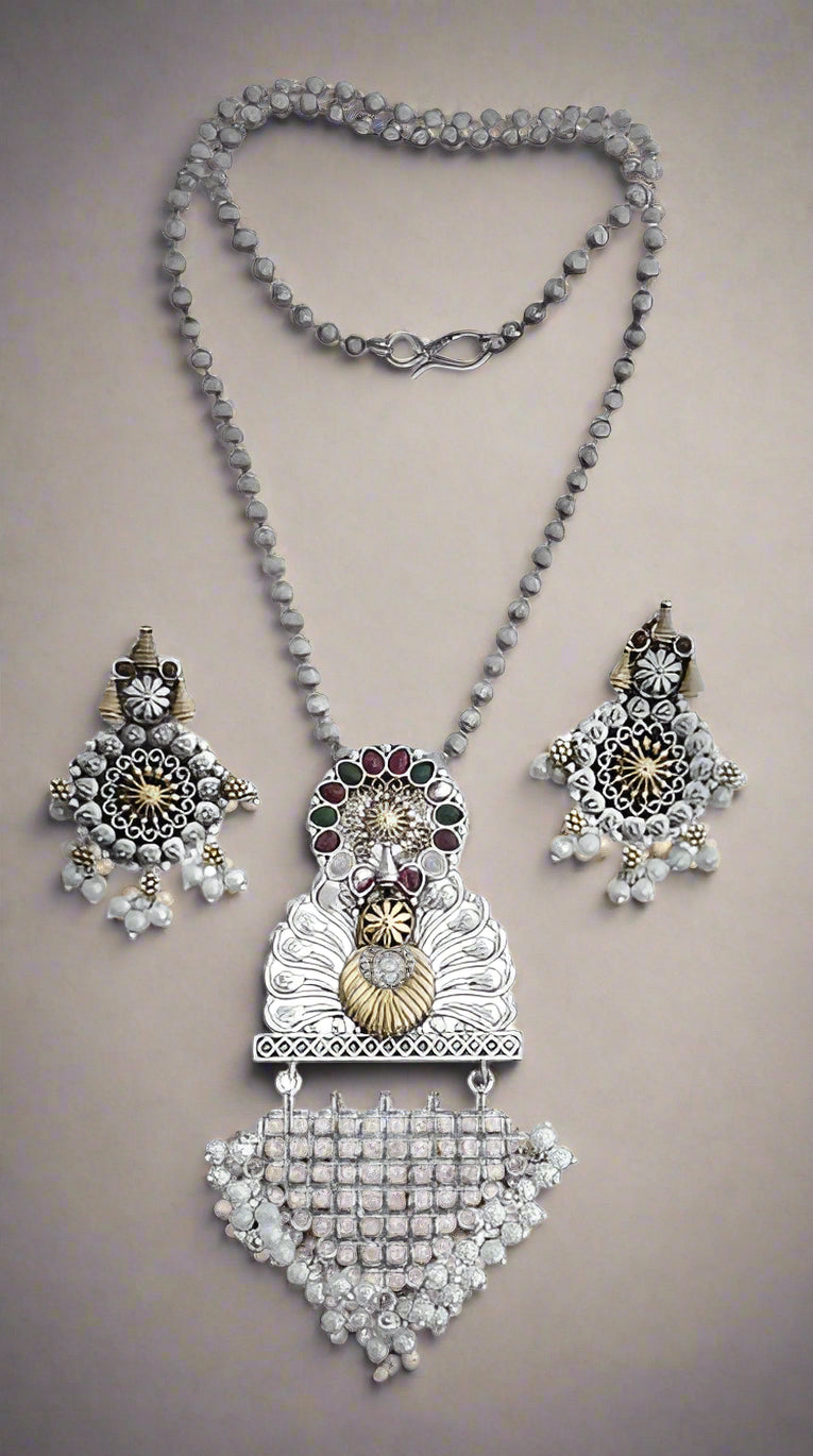 silver dancing peacock design pearl necklace with matching earrings