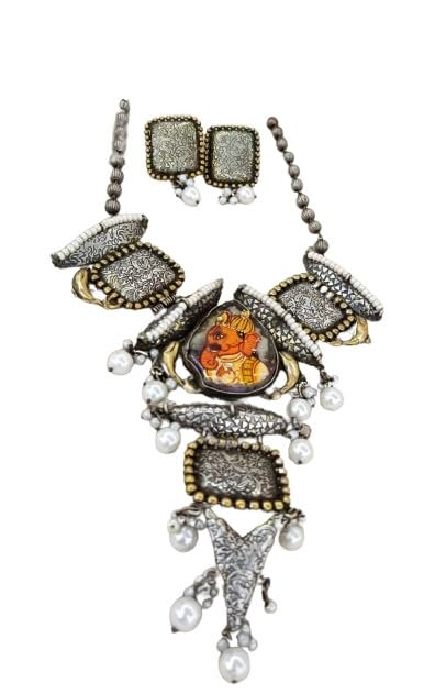 oxidized Ganesh pendant necklace set with matching earrings.