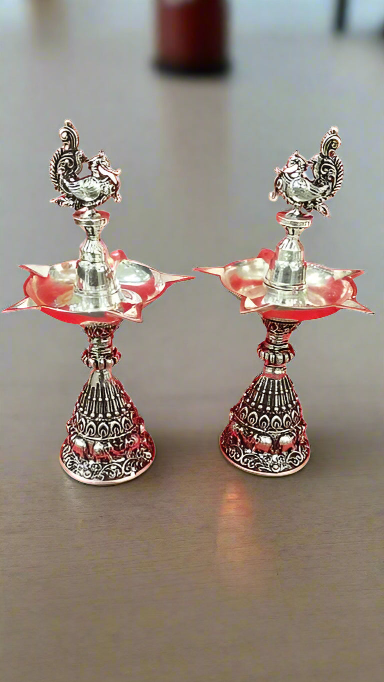 Silver Plated Antique Finish Peacock Diya with Elephant Motifs Fully Carved for Diwali Pooja