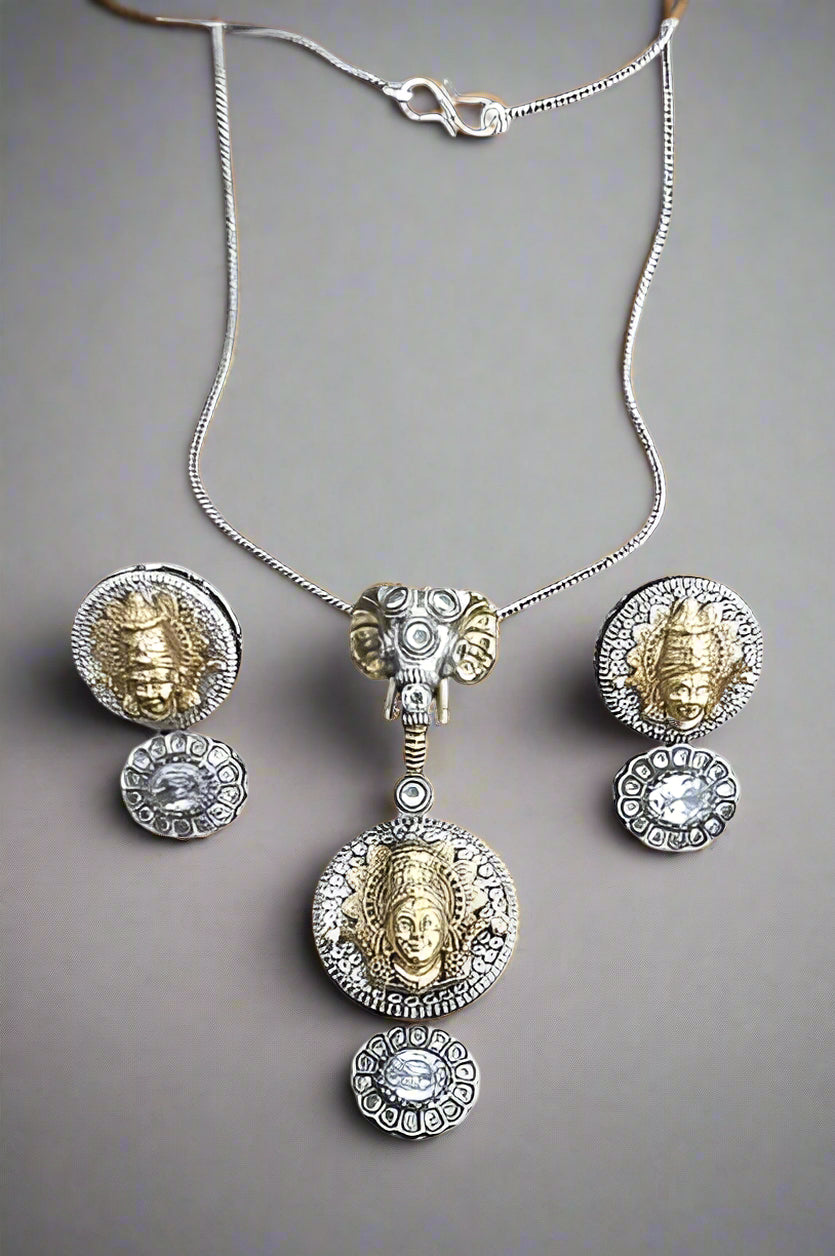 silver Ganesh pendant necklace with lakshmi earrings