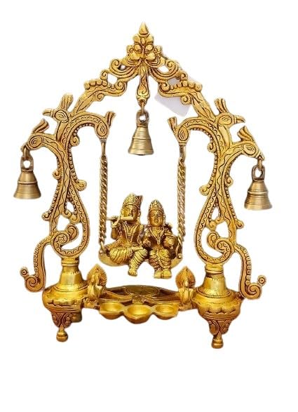indiancraftsbykanika Brass Radha Krishna on a jhula with 3 Diya and Peacock and Bells