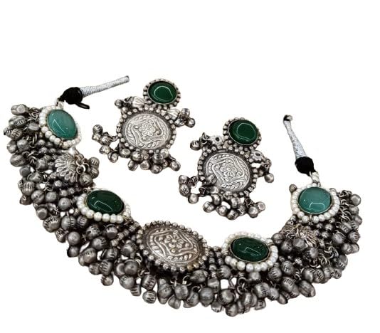 heavy oxidized with green stone ghungru choker necklace set with matching earrings.