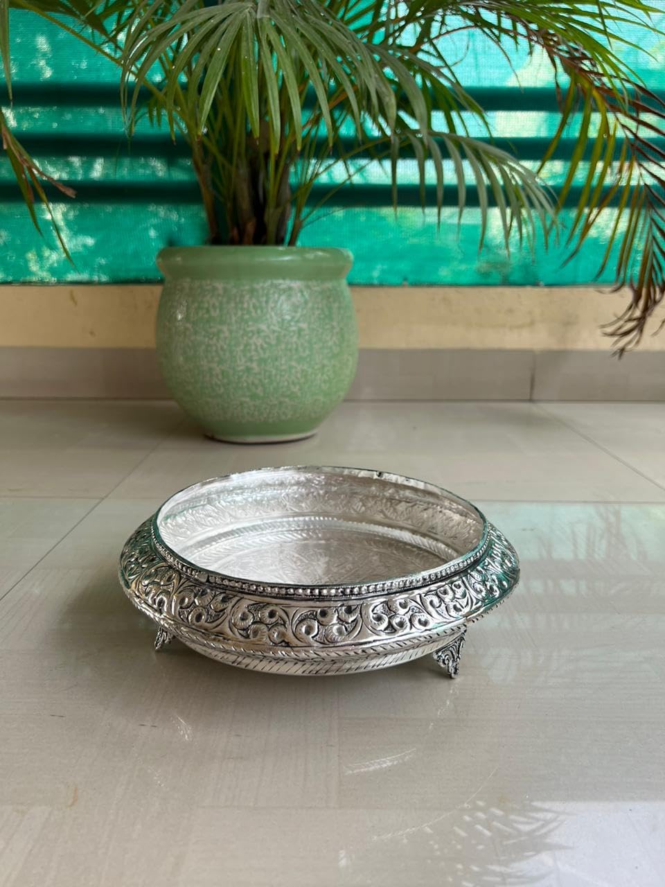 German silver Round urli with stands fully carved