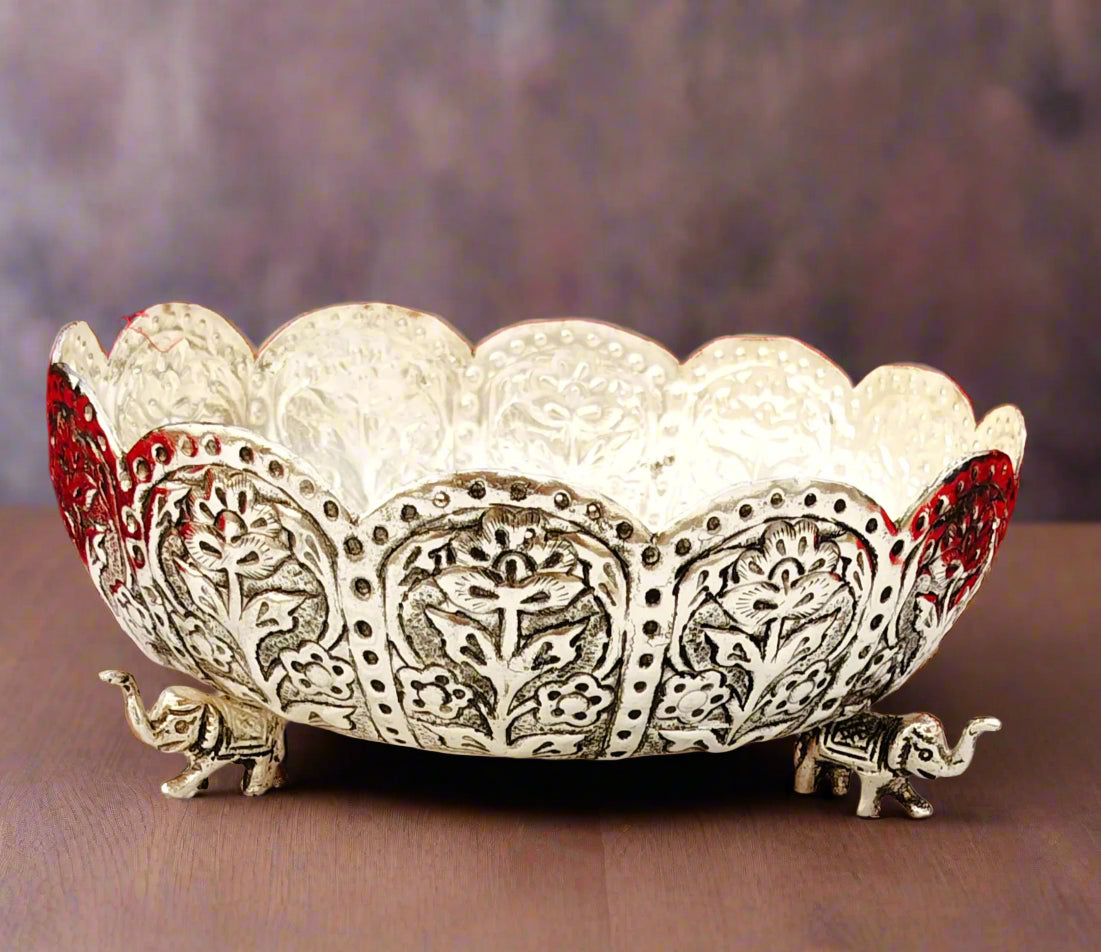 german silver fully carved urli bowl with 3 elephant legs