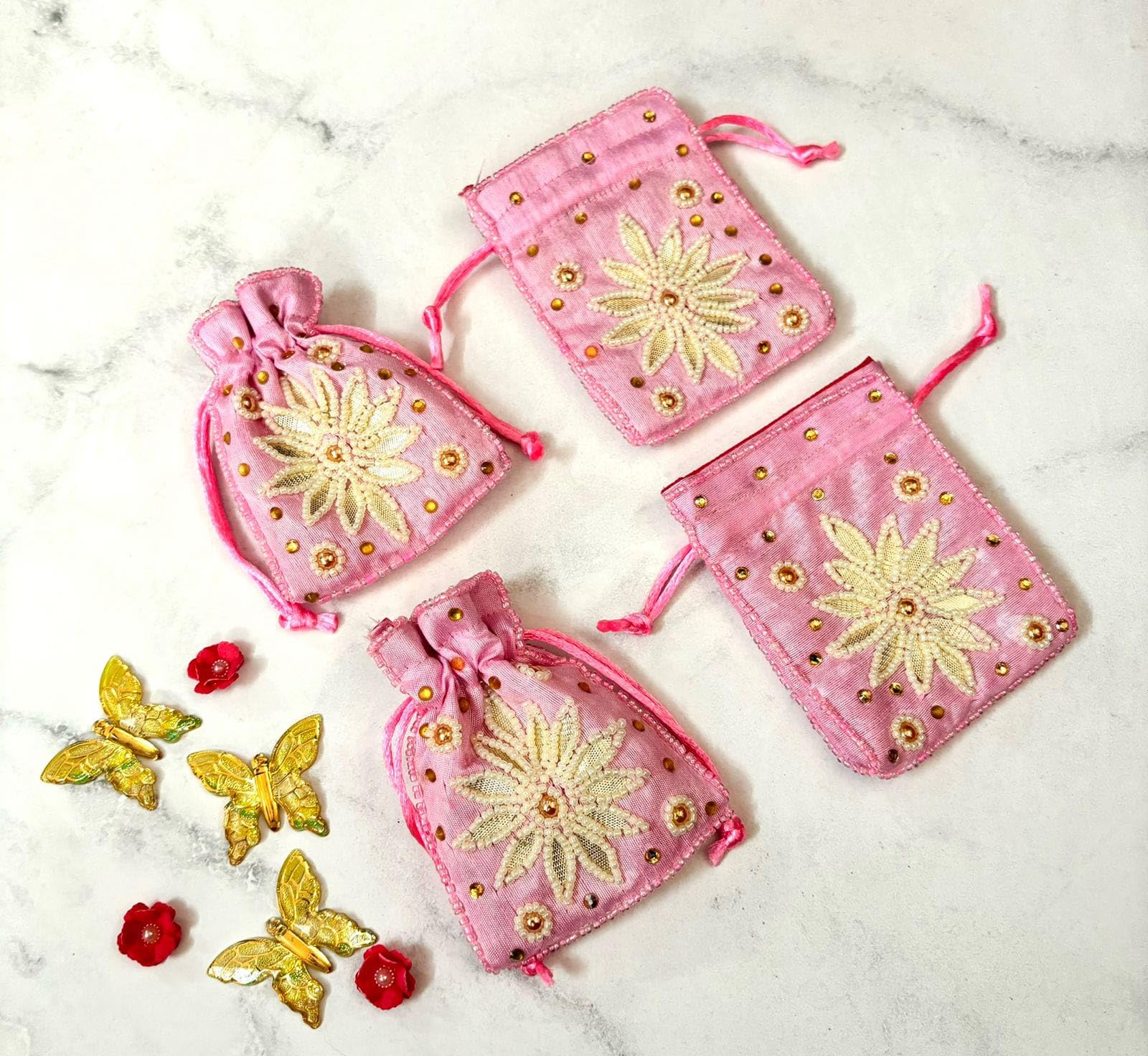 handwork pink flower coin potli give away gifts, set of 12 potlis