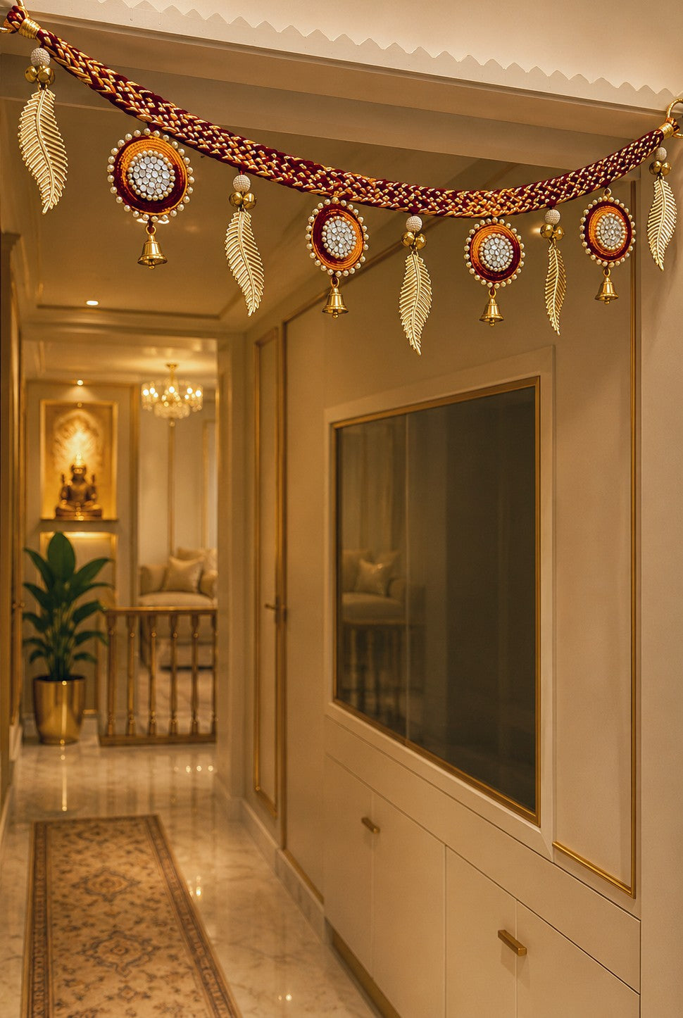 42-inch red moli kalawa thread door toran decorated with metal leaf accents and bells for Diwali and housewarming entrance decor.