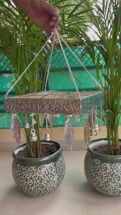 german silver  palavelli stand  with leaves and bells