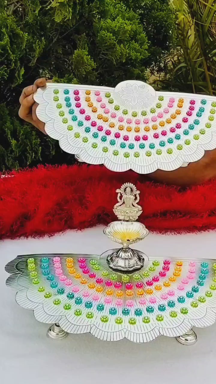 German silver flower stand with colorful flowers with lakshmi diya