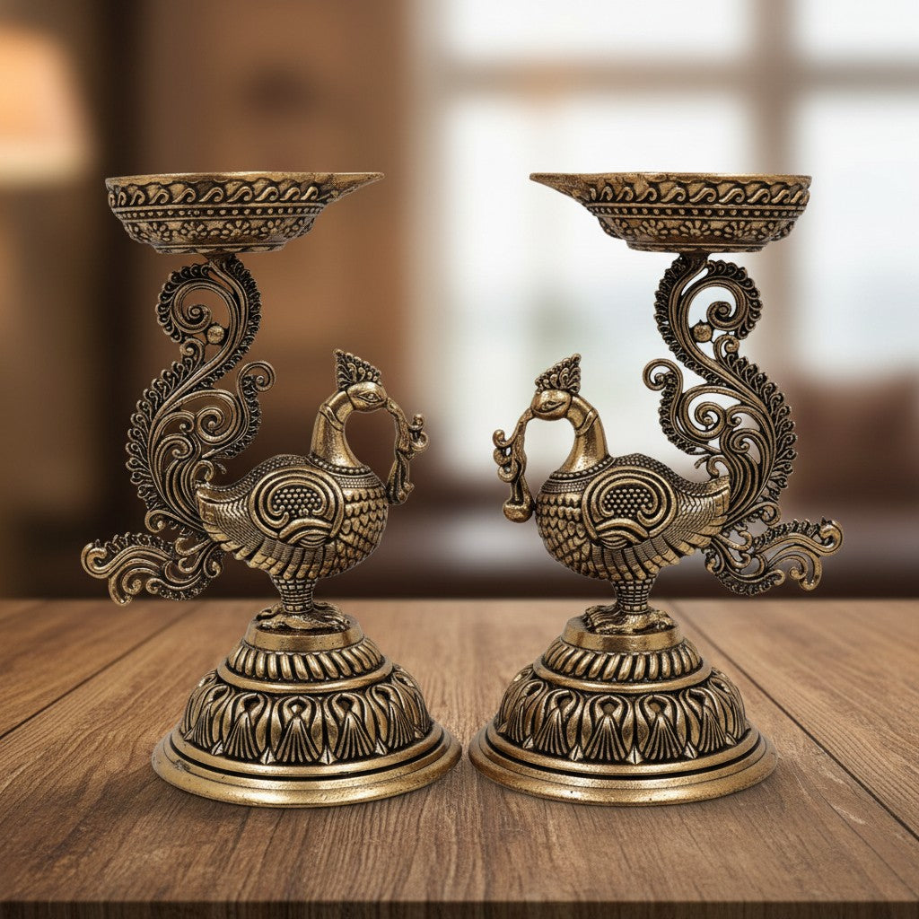 Set of 2 handcrafted brass oil lamps on peacock stands, ideal for home temples, mandirs, pooja rituals, Diwali decorations, meditation spaces, and traditional spiritual décor. 🦚🪔✨🙏🏡