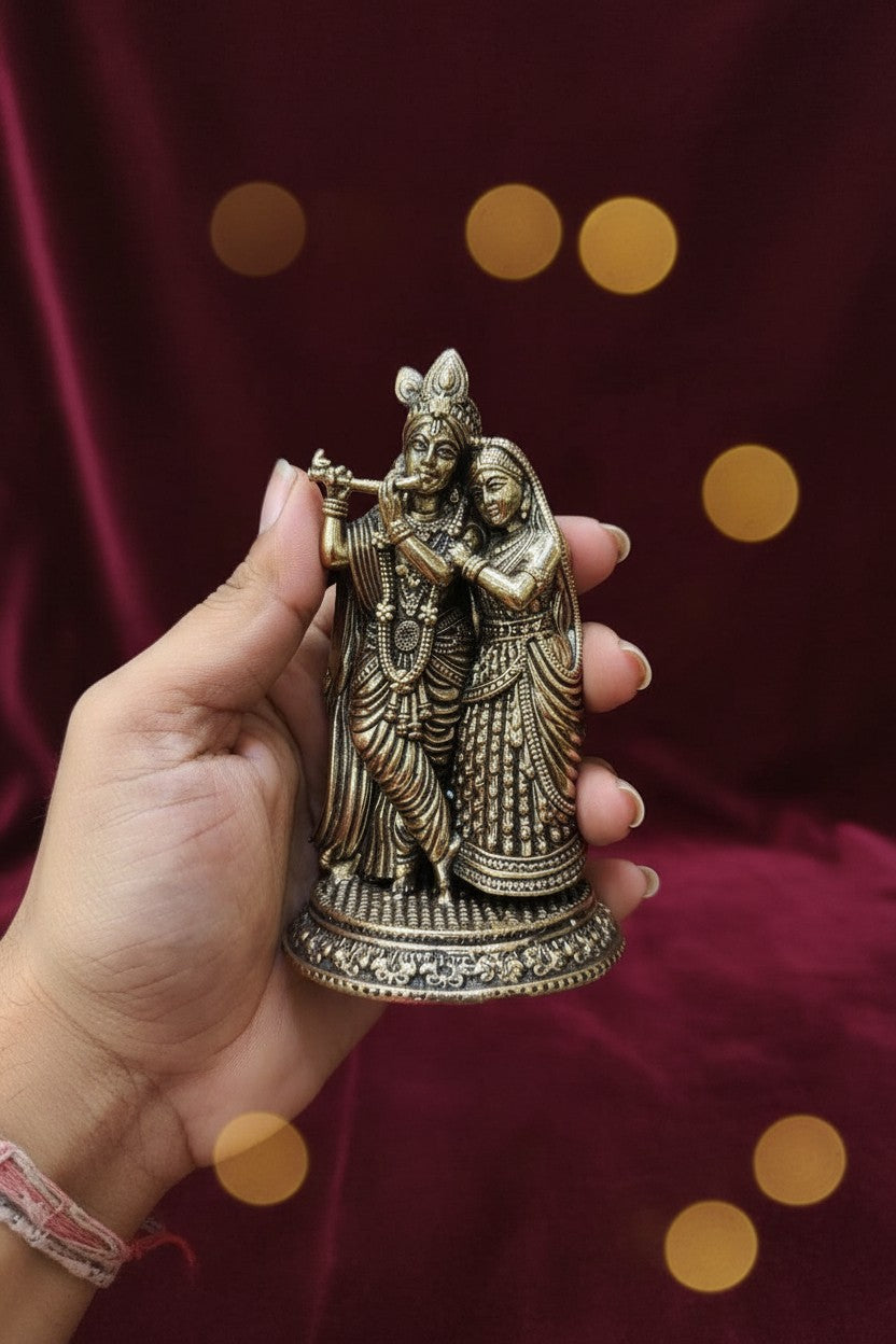 Handcrafted brass Radha Krishna statue featuring the divine Jugal Jodi, ideal for home temples, pooja rooms, meditation spaces, Janmashtami celebrations, spiritual décor, and meaningful gifting. 🦚💖✨🙏