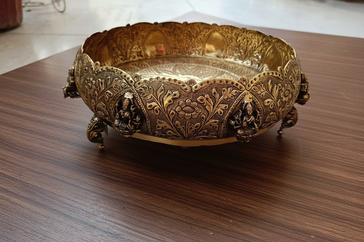 Handcrafted pure brass Ashtalakshmi urli bowl with decorative elephant legs, ideal for floating flowers, candles, pooja rooms, Diwali décor, festive centerpieces, and elegant home decoration. 🪔🐘✨🌸🏡