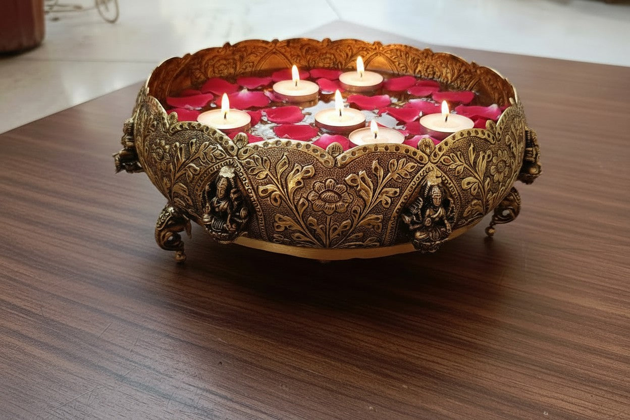 Handcrafted pure brass Ashtalakshmi urli bowl with decorative elephant legs, ideal for floating flowers, candles, pooja rooms, Diwali décor, festive centerpieces, and elegant home decoration. 🪔🐘✨🌸🏡