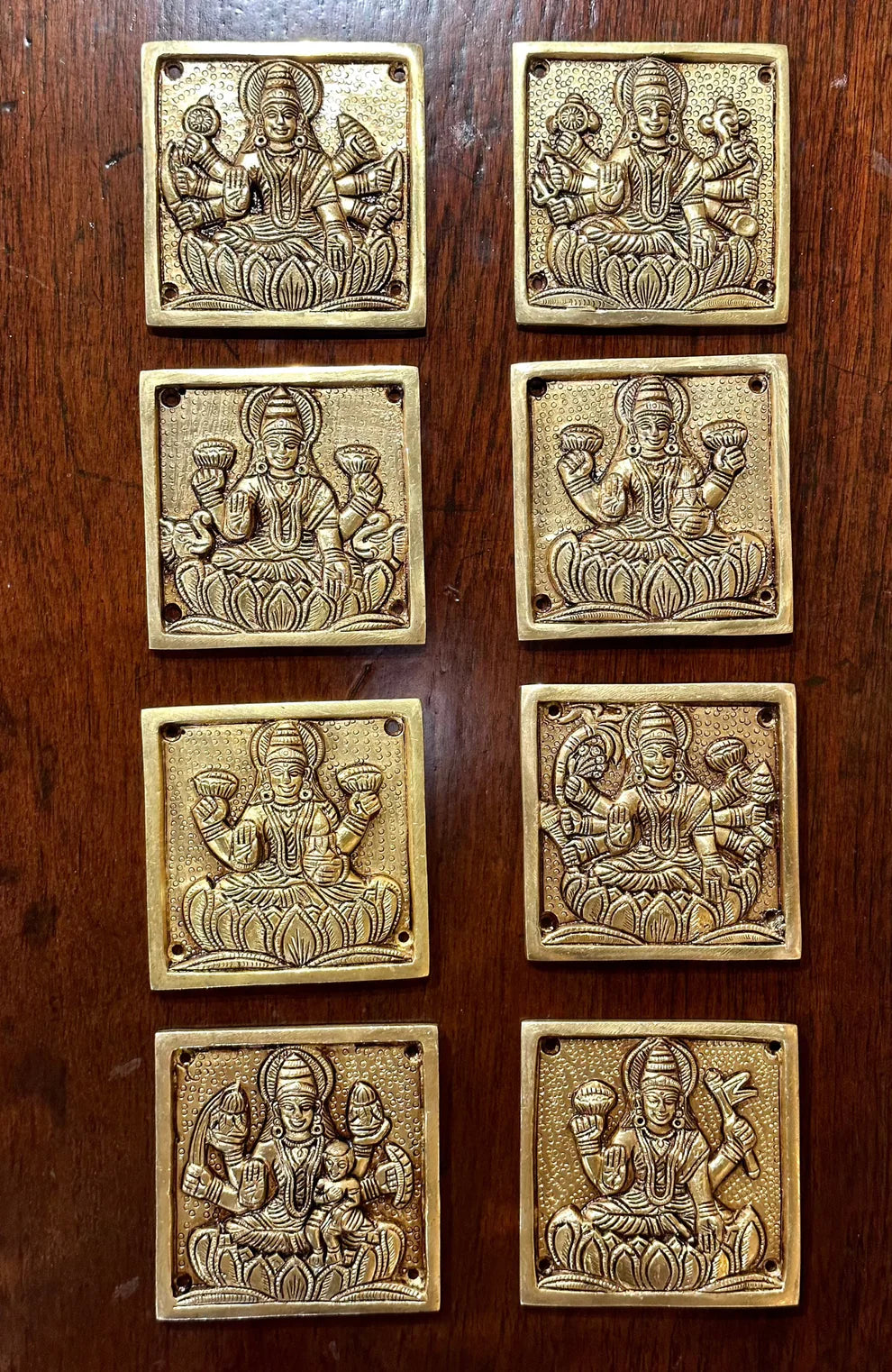 Set of 8 Ashtalakshmi engraved brass wall plates featuring the eight forms of Goddess Lakshmi, ideal for pooja rooms, home temples, living rooms, offices, entrances, and spiritual décor. 🪔✨🙏🏡