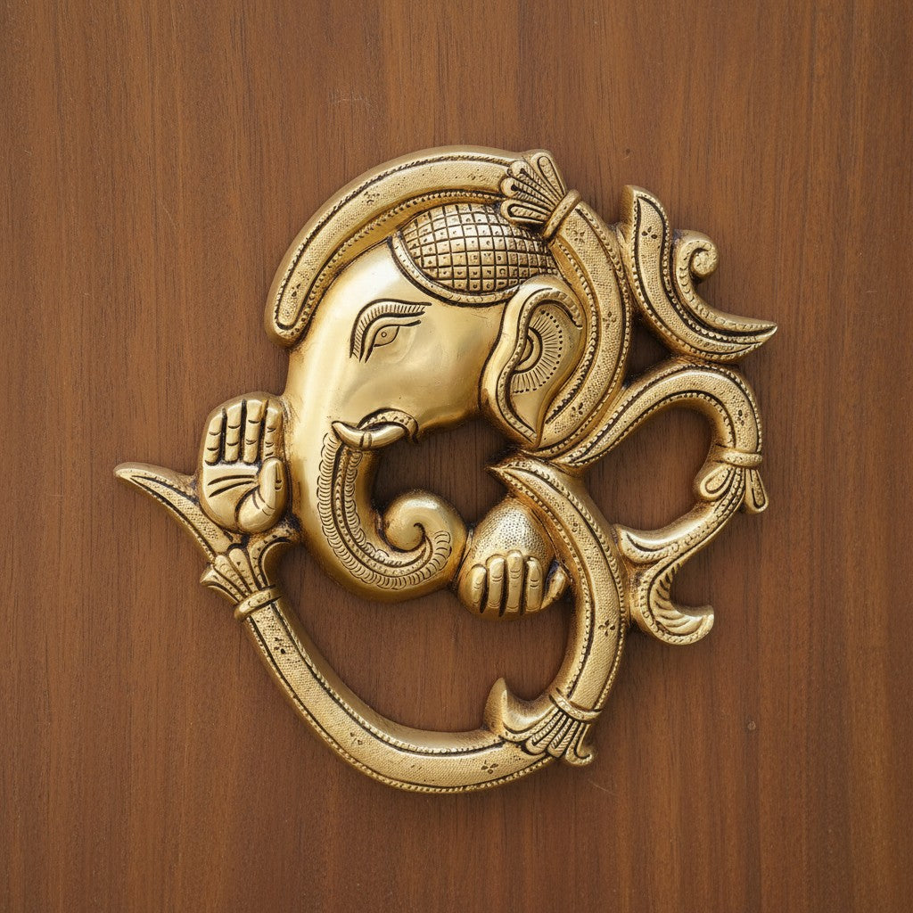 andcrafted brass Om Ganesh wall hanging for home entrances, temples, offices, and Vastu décor, symbolizing positivity, prosperity, protection, and divine blessings. 🕉️✨🙏🏡