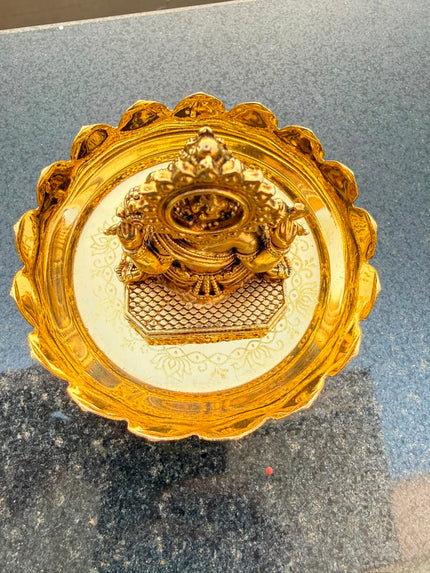 Handcrafted brass Lord Ganesha idol seated on a decorative lotus stand, ideal for pooja rooms, home temples, Vastu décor, meditation spaces, and spiritual gifting. 🕉️🌸✨🙏
