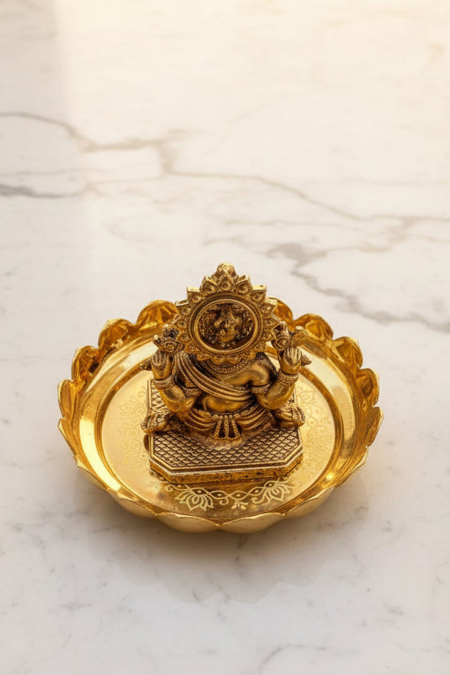 Handcrafted brass Lord Ganesha idol seated on a decorative lotus stand, ideal for pooja rooms, home temples, Vastu décor, meditation spaces, and spiritual gifting. 🕉️🌸✨🙏