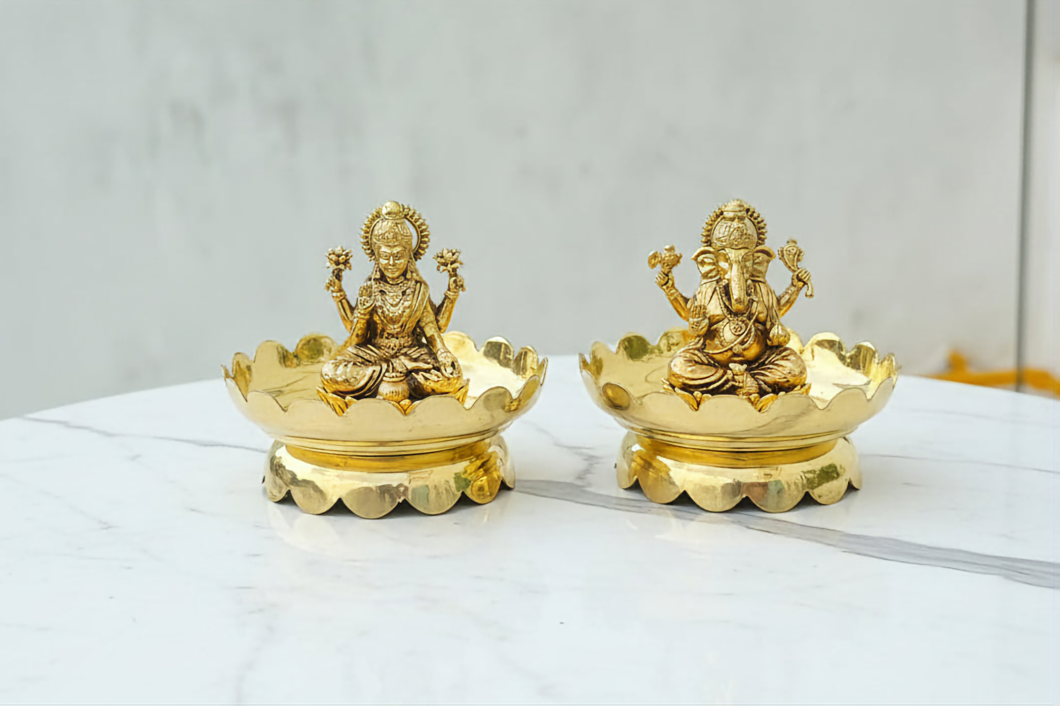 Handcrafted brass Lakshmi Ganesh idol set on decorative lotus stands, ideal for pooja rooms, Diwali celebrations, home temples, spiritual décor, and housewarming gifts. 🪔✨🙏🌸