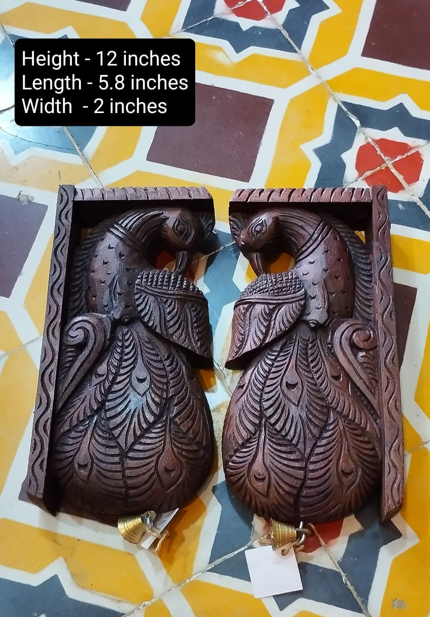 Set of 2 handmade handpainted wooden peacock wall brackets featuring hand-carved traditional Indian designs, perfect as decorative shelf corbels and heritage-inspired home décor accents.