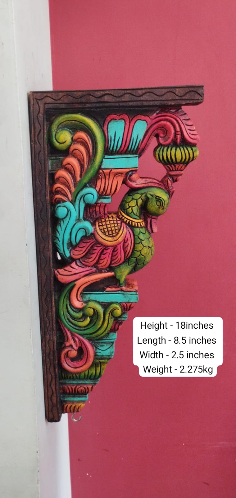 Set of 2 handcrafted and handpainted wooden peacock wall brackets featuring colorful traditional Indian artwork for home décor and heritage-inspired interiors.